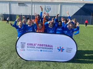 Our girls' football team at the WBA Dome